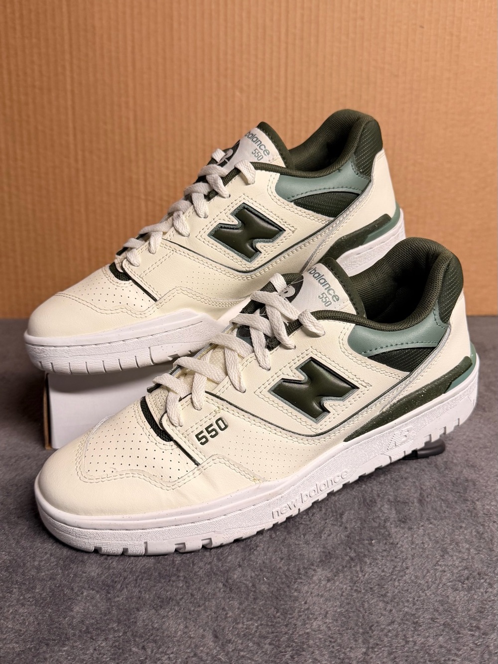 New Balance 550 Low-Top Sneakers in Cream and Olive Green
